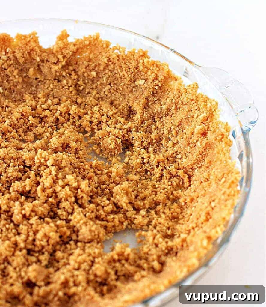 Pumpkin Pie with Graham Cracker Crust Recipe for Fall Baking 6 The final crumb crust needs to chill while you make the filling.