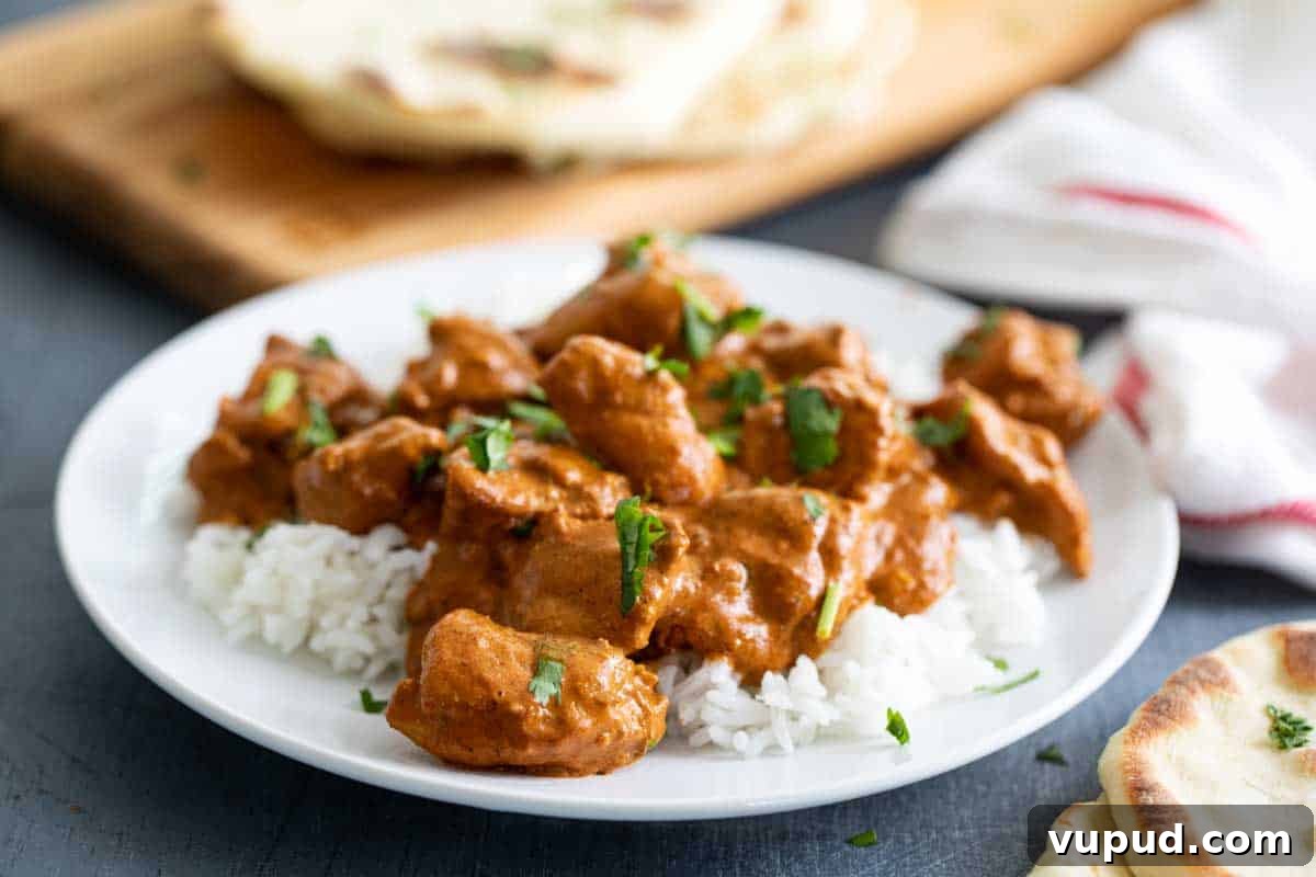 Butter Chicken Butter Chicken over rice on a plate