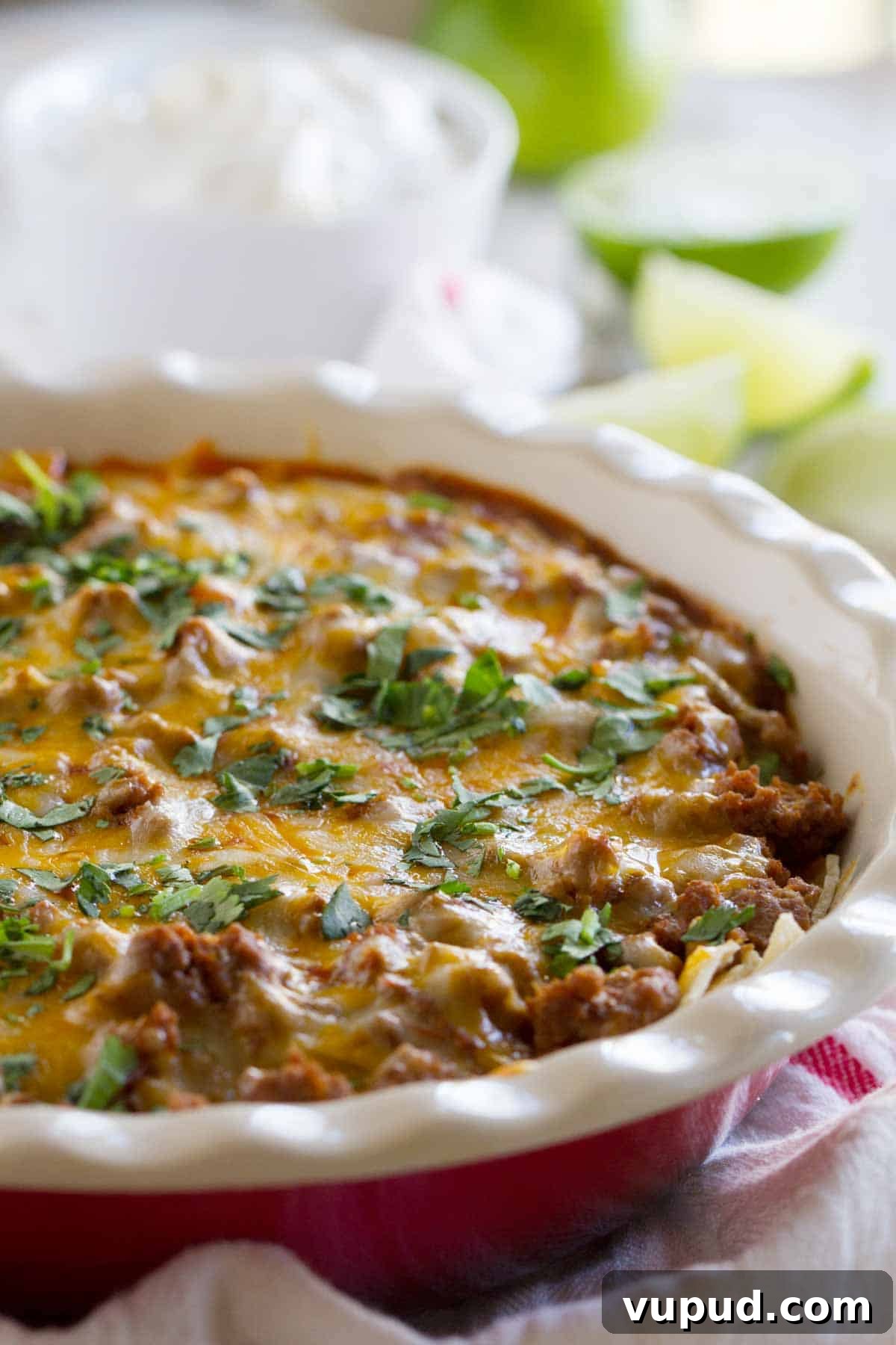 Beef Enchilada Casserole Beef Enchilada Casserole in a dish with cilantro sprinkled on top