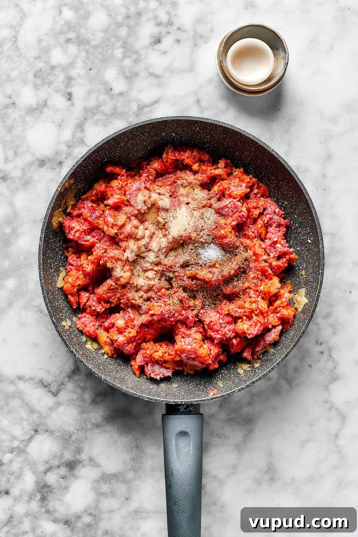 Million-Dollar Spaghetti Recipe: Decadent Creamy Garlic Pasta 2 Breaking up the meat and adding spices.