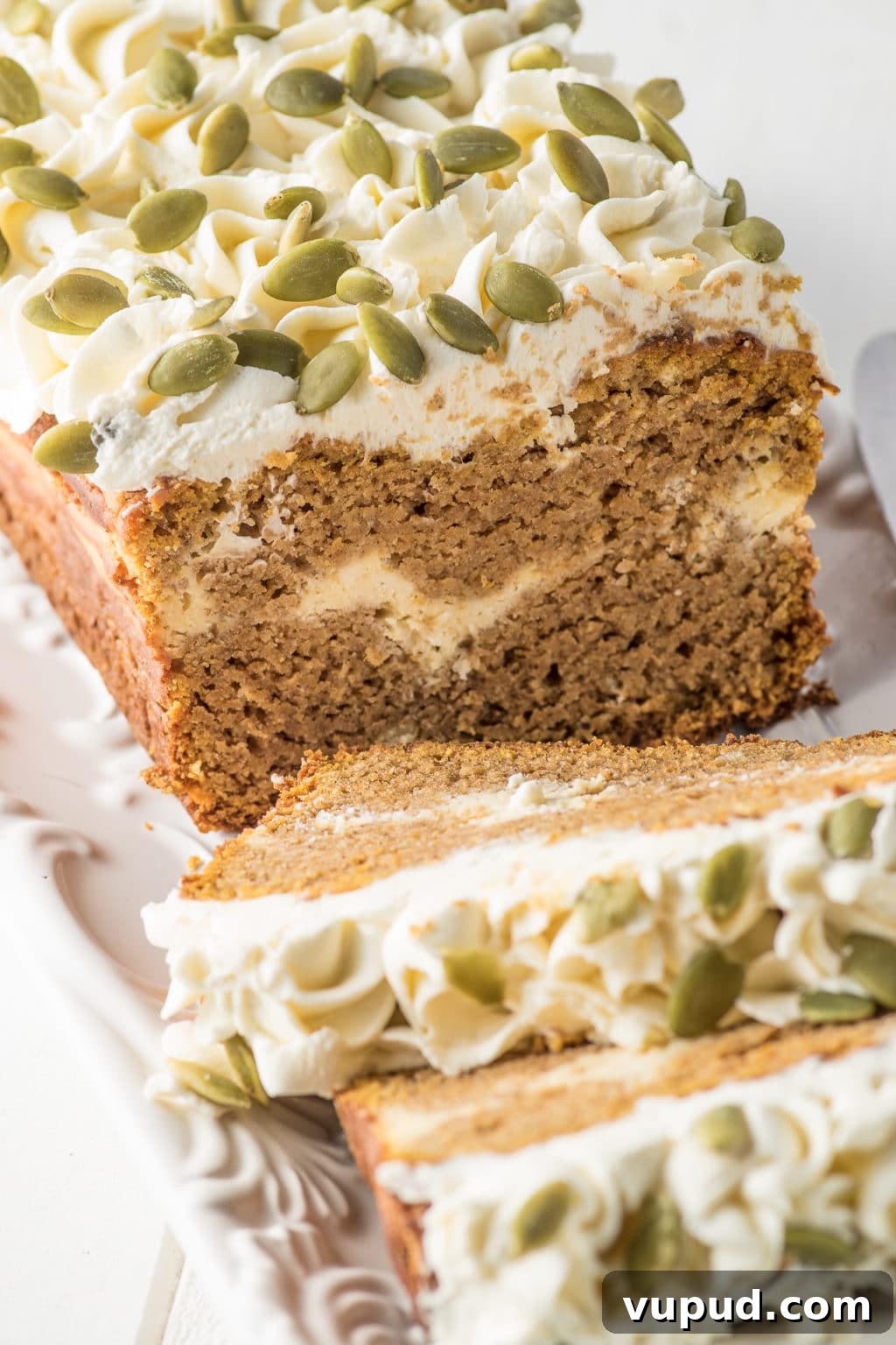 Low-Carb Spiced Pumpkin Bread Stuffed with Cheesecake 3 Finished pumpkin bread on a serving tray.