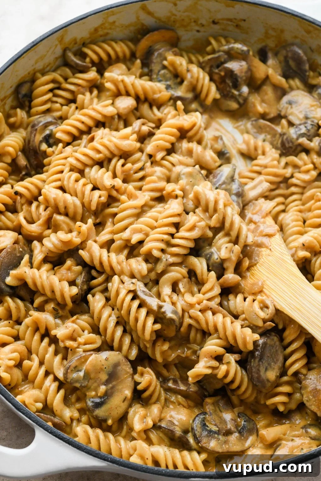 Cashew Cream Mushroom Stroganoff (Gluten-Free) 3 A large ceramic skillet of creamy vegan mushroom stroganoff