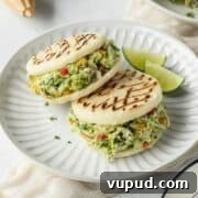 Reina Pepiada Arepa: Venezuelan Chicken & Avocado Recipe 12 Two reina pepiada arepas on a plate