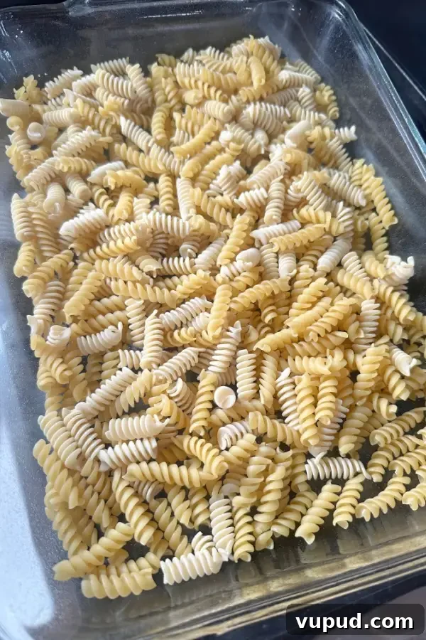 Baked Meatball Casserole One-Dish Dinner Recipe 3 rotini pasta in baking dish
