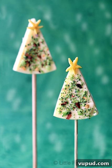 27+ Festive Christmas Finger Food Appetizers for Holiday Parties 16 Christmas tree cheese wedges.