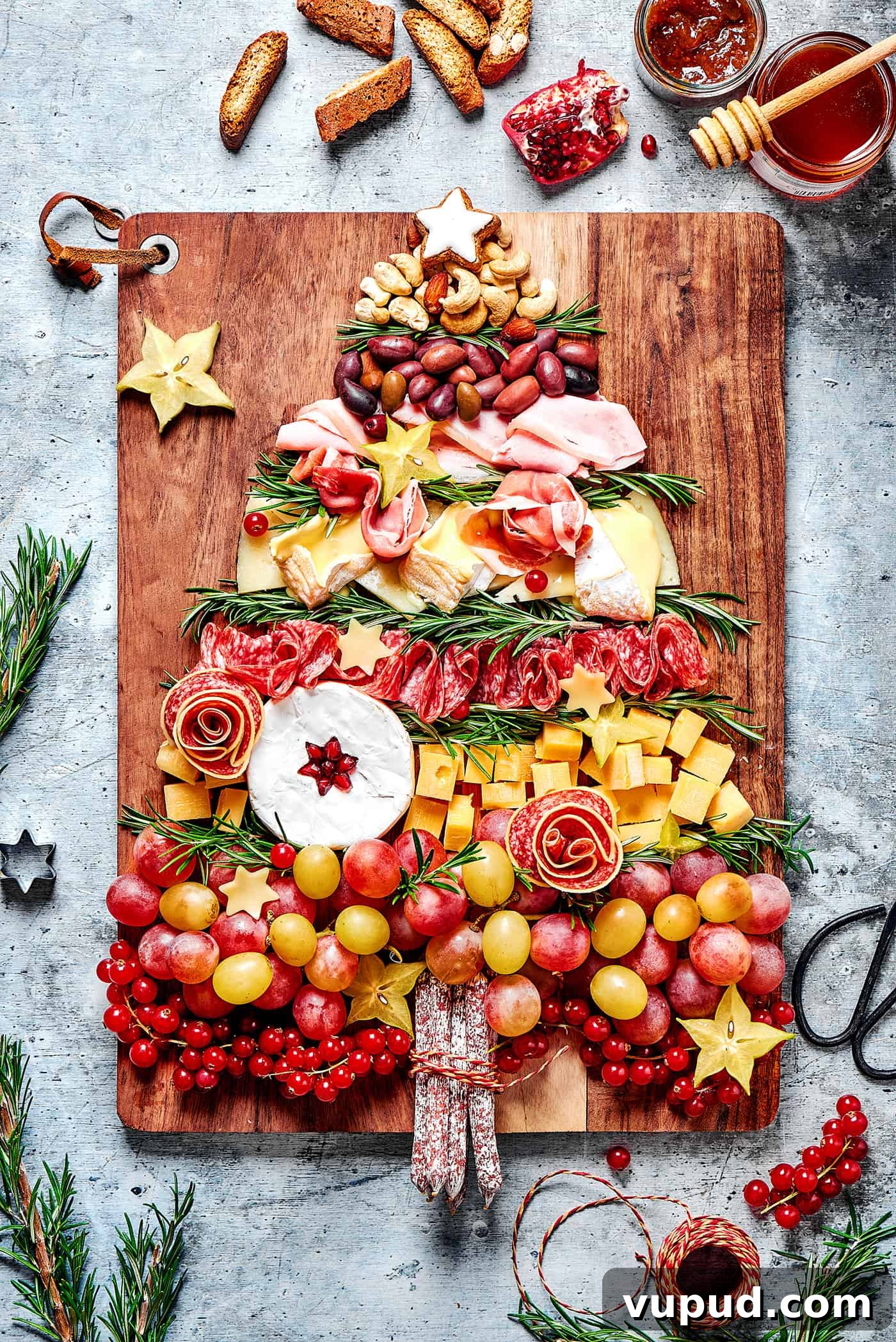27+ Festive Christmas Finger Food Appetizers for Holiday Parties 18 A Christmas Charcuterie Board shaped like a tree.