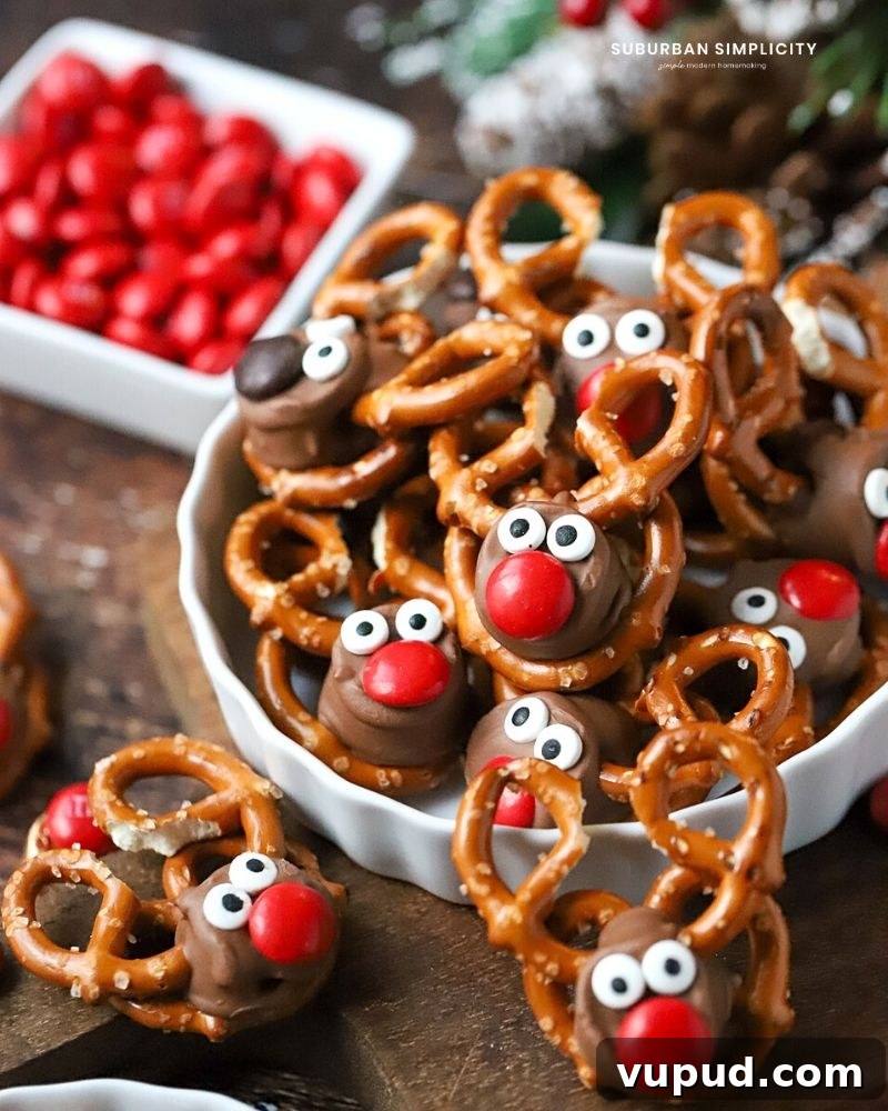 27+ Festive Christmas Finger Food Appetizers for Holiday Parties 21 Pretzel Rolo Reindeer in a dish