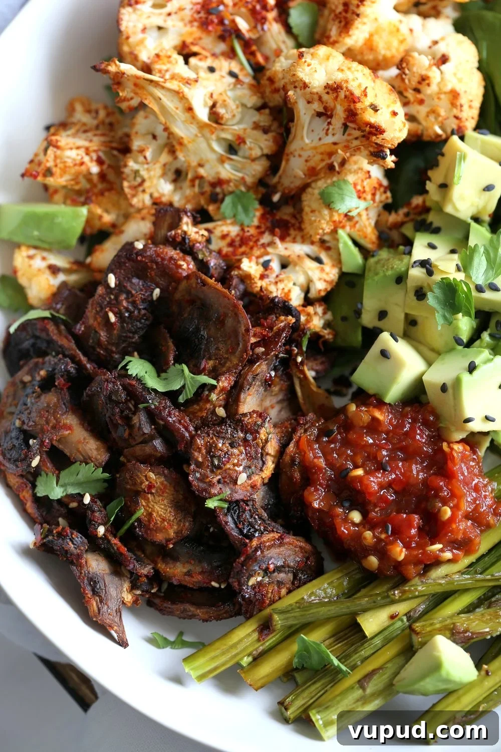 Bulgogi Roasted Spring Vegetable Bowl with Sesame Rice 4 Bulgogi Roasted Spring Veggie Bowl. Spicy, sweet Korean Gochugaru blend roasted Cauliflower Mushroom Asparagus Bowl. #Vegan #Glutenfree #Nutfree #Recipe #VeganRicha | VeganRicha.com