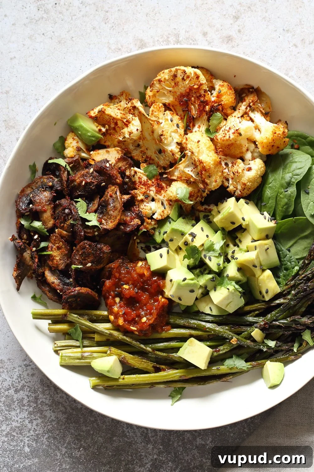 Bulgogi Roasted Spring Vegetable Bowl with Sesame Rice 7 Bulgogi Roasted Spring Veggie Bowl. Spicy, sweet Korean Gochugaru blend roasted Cauliflower Mushroom Asparagus Bowl. #Vegan #Glutenfree #Nutfree #Recipe #VeganRicha | VeganRicha.com
