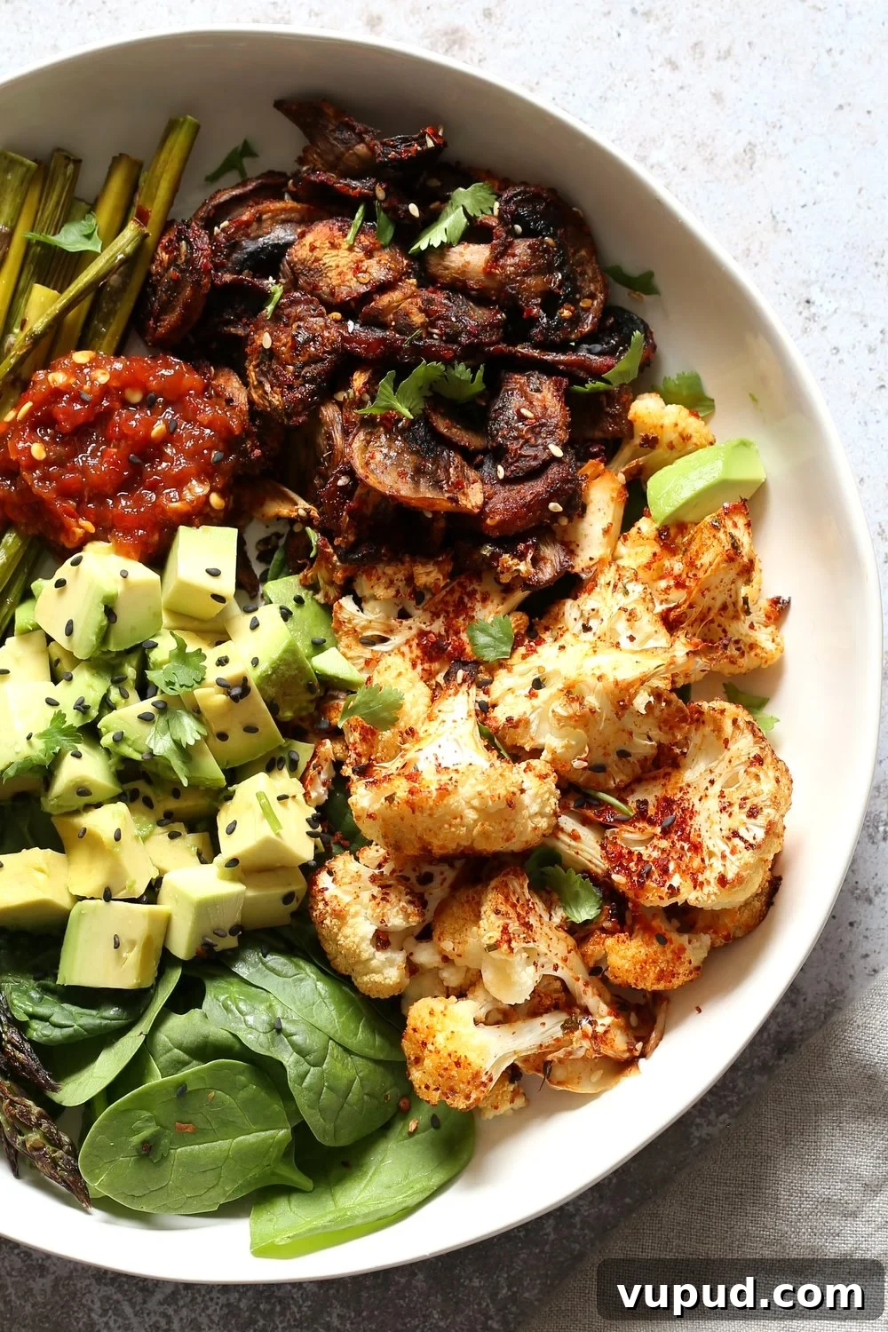 Bulgogi Roasted Spring Vegetable Bowl with Sesame Rice 9 Bulgogi Roasted Spring Veggie Bowl. Spicy, sweet Korean Gochugaru blend roasted Cauliflower Mushroom Asparagus Bowl. #Vegan #Glutenfree #Nutfree #Recipe #VeganRicha | VeganRicha.com