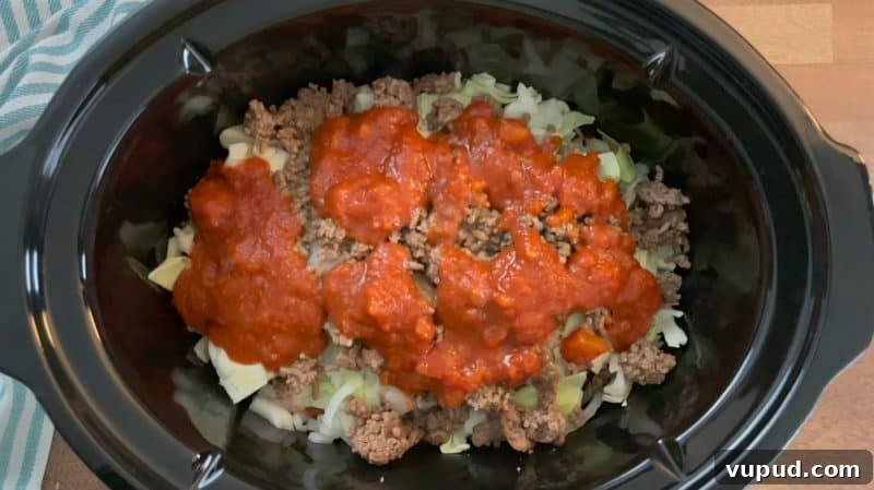 Slow Cooker Cabbage Casserole - Uses Spaghetti Sauce! repeat the layers again