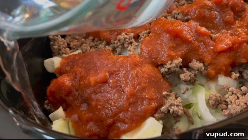 Cabbage Casserole: Oven or Slow Cooker Recipe Guide 3 pour in cup of water in the crockpot