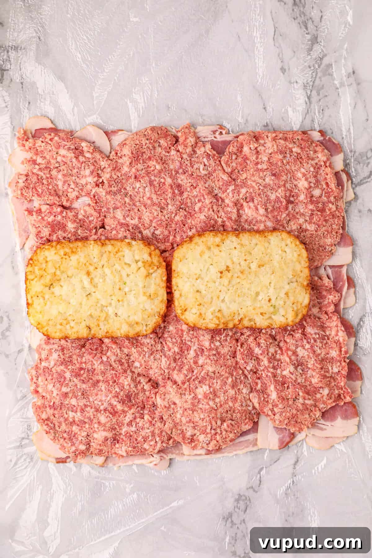 Smoked Breakfast Fatty: Savory Brisket-Wrapped Morning Roast 7 Adding Hash Brown Patties to the Smoked Breakfast Recipe