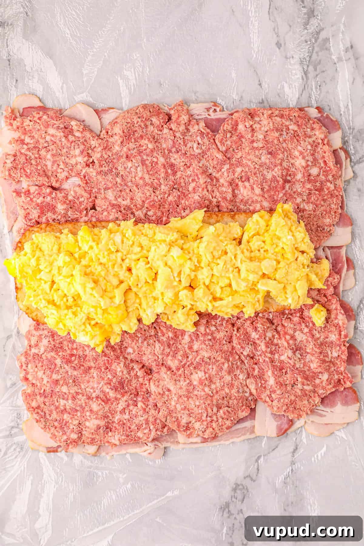 Smoked Breakfast Fatty: Savory Brisket-Wrapped Morning Roast 8 Topping with Prepared Scrambled Eggs for Smoked Breakfast Fatty Recipe