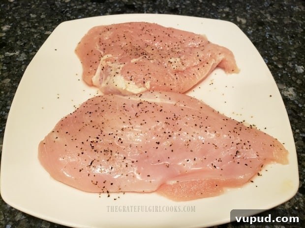 Seasoned chicken breasts Seasoned chicken breasts on a plate