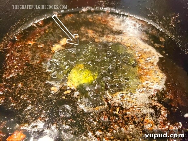 Making the sauce Jalapeño pepper jelly added to browned butter in skillet