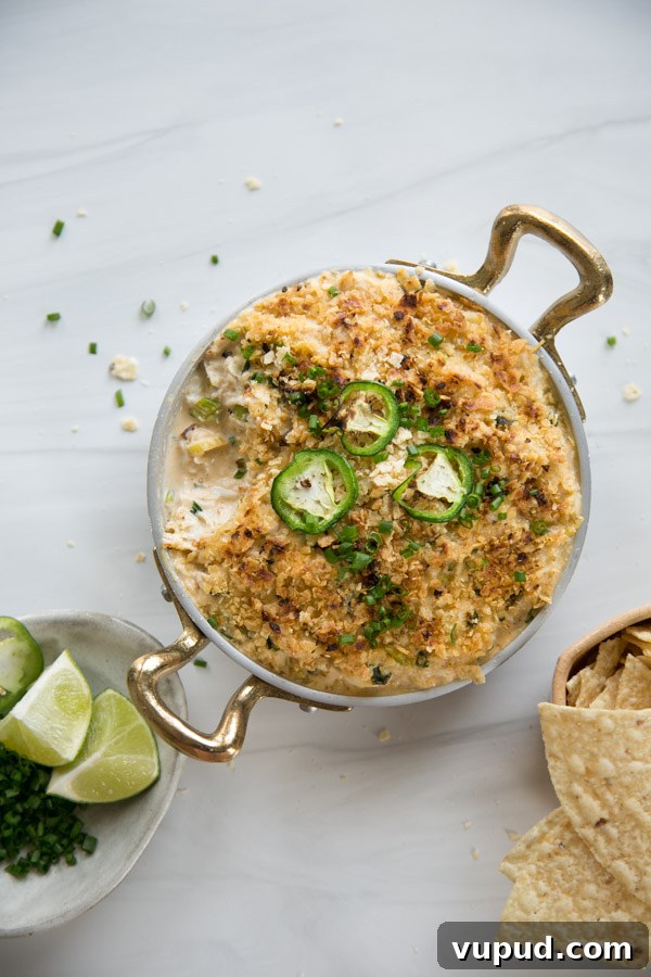 10-Minute Crab Dip with Crispy Tortilla Crust 2 hot crab dip in oven proof skillet with tortilla chips
