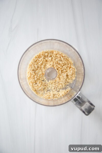 10-Minute Crab Dip with Crispy Tortilla Crust 12 tortilla chips in a food processor