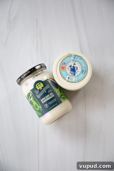 10-Minute Crab Dip with Crispy Tortilla Crust 6 mayo and creme fraiche jars on counter