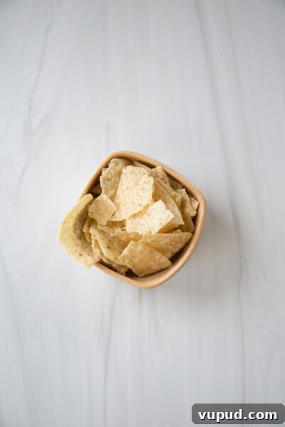 10-Minute Crab Dip with Crispy Tortilla Crust 8 gluten-free tortilla chips in a bowl