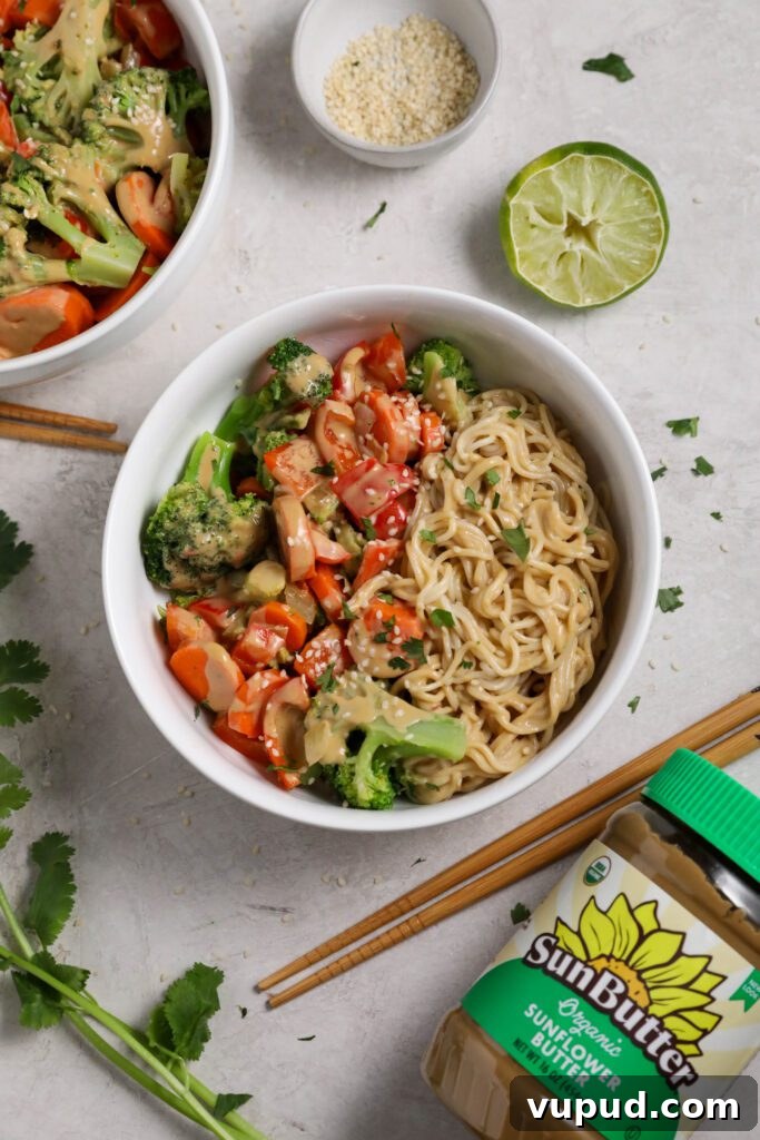 SunButter Peanut Butter Ramen Bowls: Creamy Savory Noodle Recipe 8 SunButter Ramen Noodle Bowls served in bowls with cilantro and sesame seeds and chopsticks by Flora & Vino