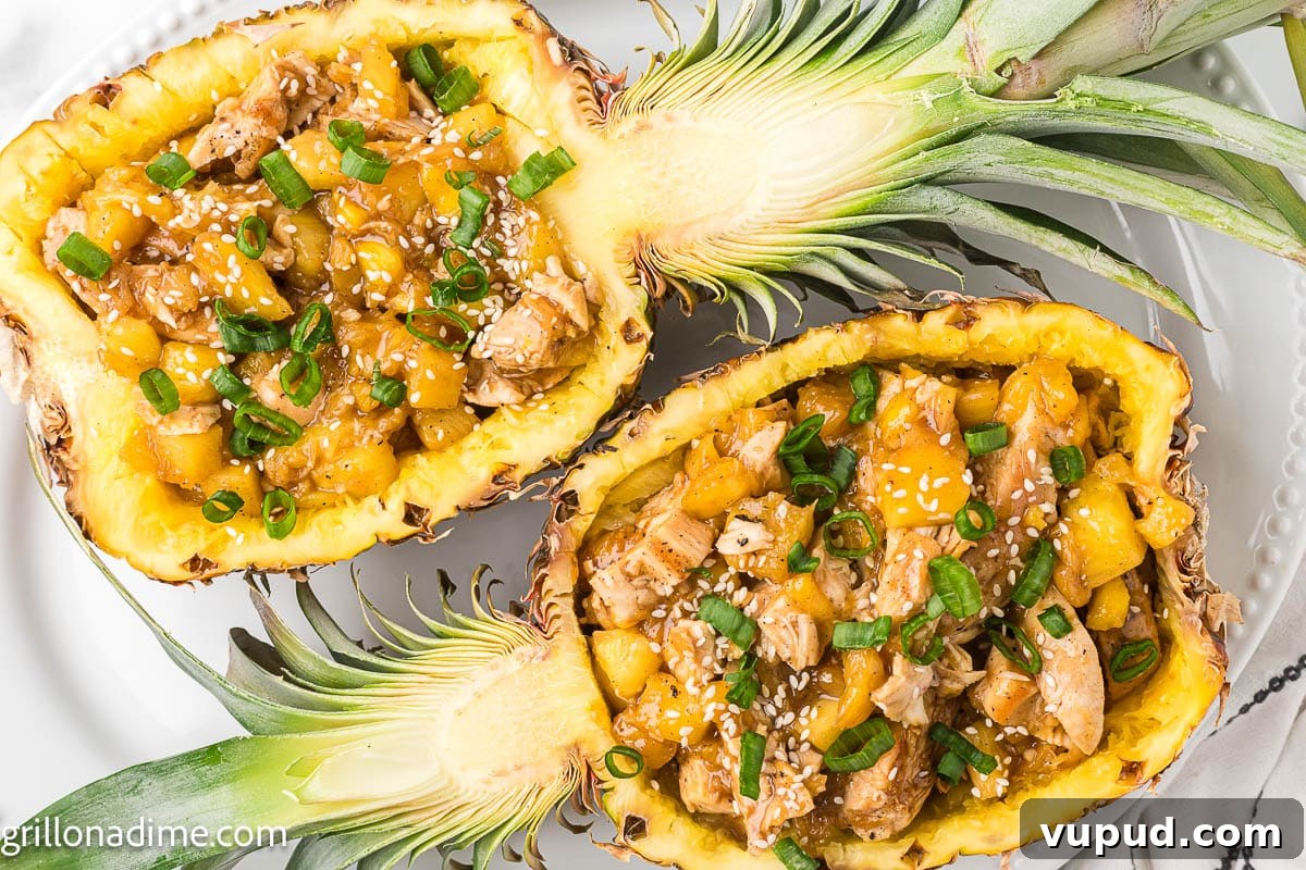 Crispy Pineapple Chicken on the Blackstone Grill: Sweet & Savory Recipe 2 Pineapple Chicken in the hollow part of a whole pineapple