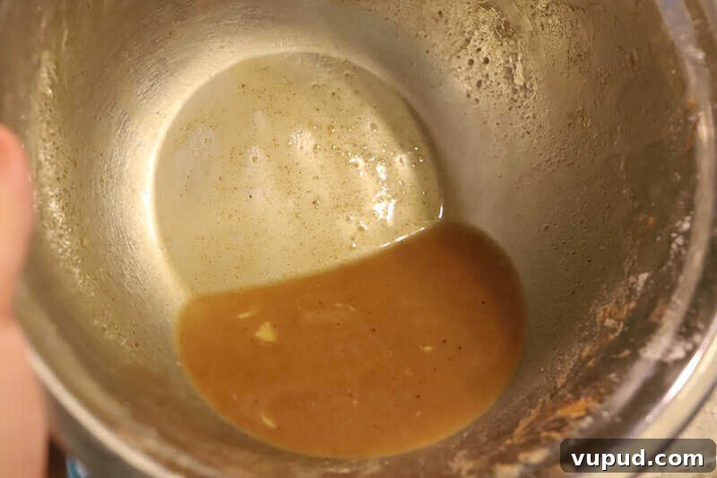 Caramel-Streusel Dutch Apple Pie Recipe 4 leftover juice in a mixing bowl