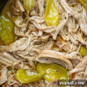 Crockpot Mississippi Chicken: Slow Cooker Recipe for Tender Flavor 11 shredded Mississippi Chicken with pepperoncini peppers