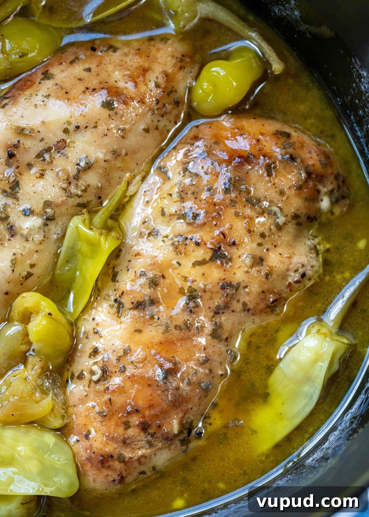 Crockpot Mississippi Chicken: Slow Cooker Recipe for Tender Flavor 4 slow cooker full of chicken breasts in "mississippi sauce" with ranch and pepperoncinis