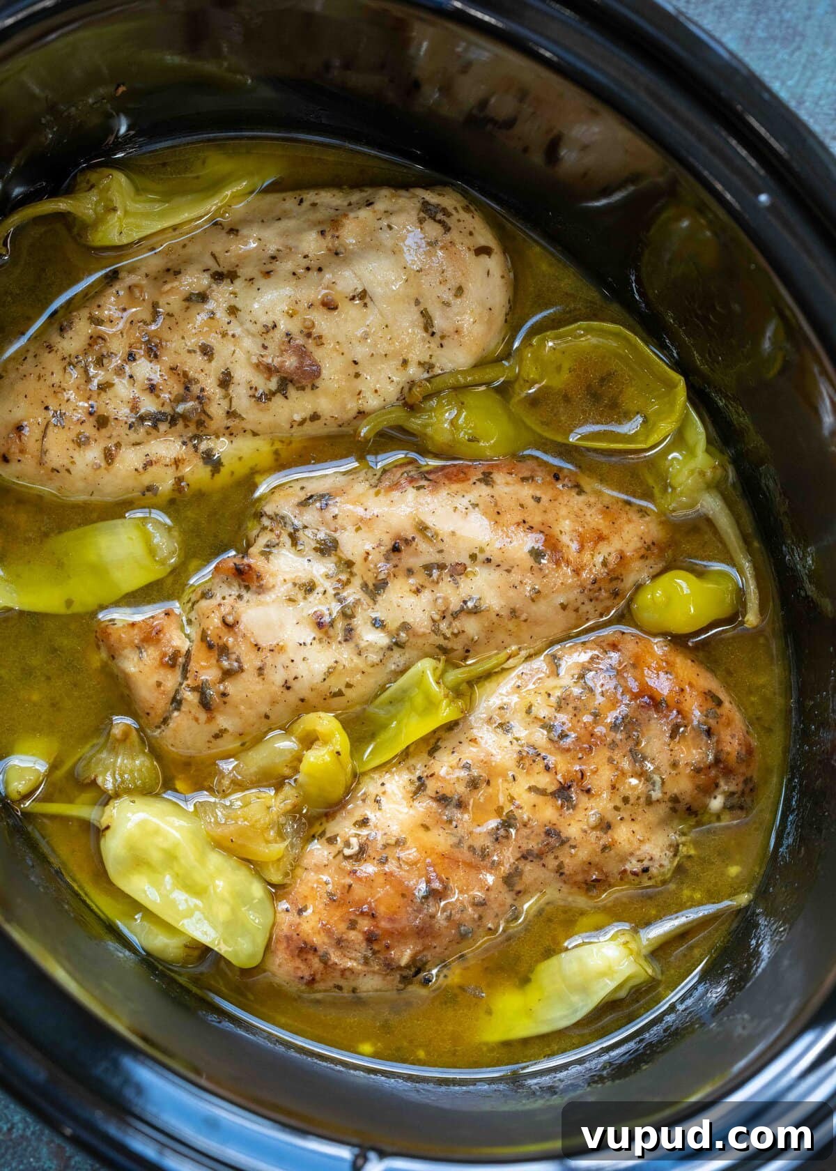 Crockpot Mississippi Chicken: Slow Cooker Recipe for Tender Flavor 7 Cooked chicken breasts in a ranch and pepperoncini sauce