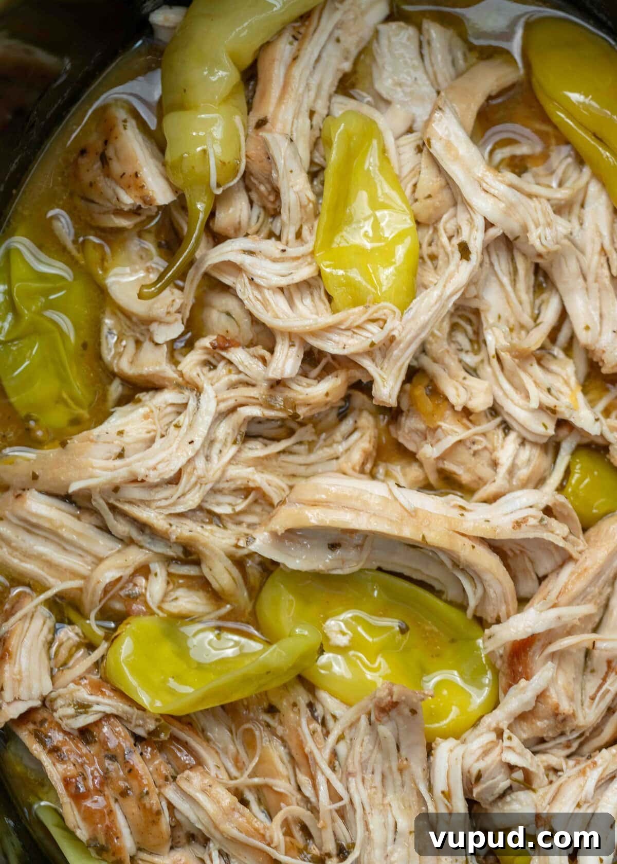 Crockpot Mississippi Chicken: Slow Cooker Recipe for Tender Flavor 10 shredded Mississippi Chicken with pepperoncini peppers