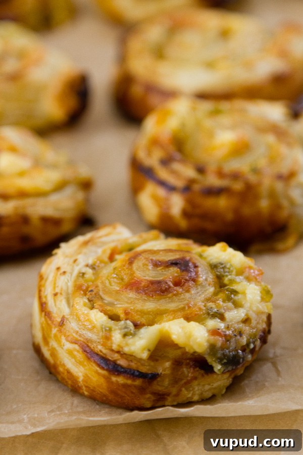 Several puff pastry pinwheels cooling and ready to eat