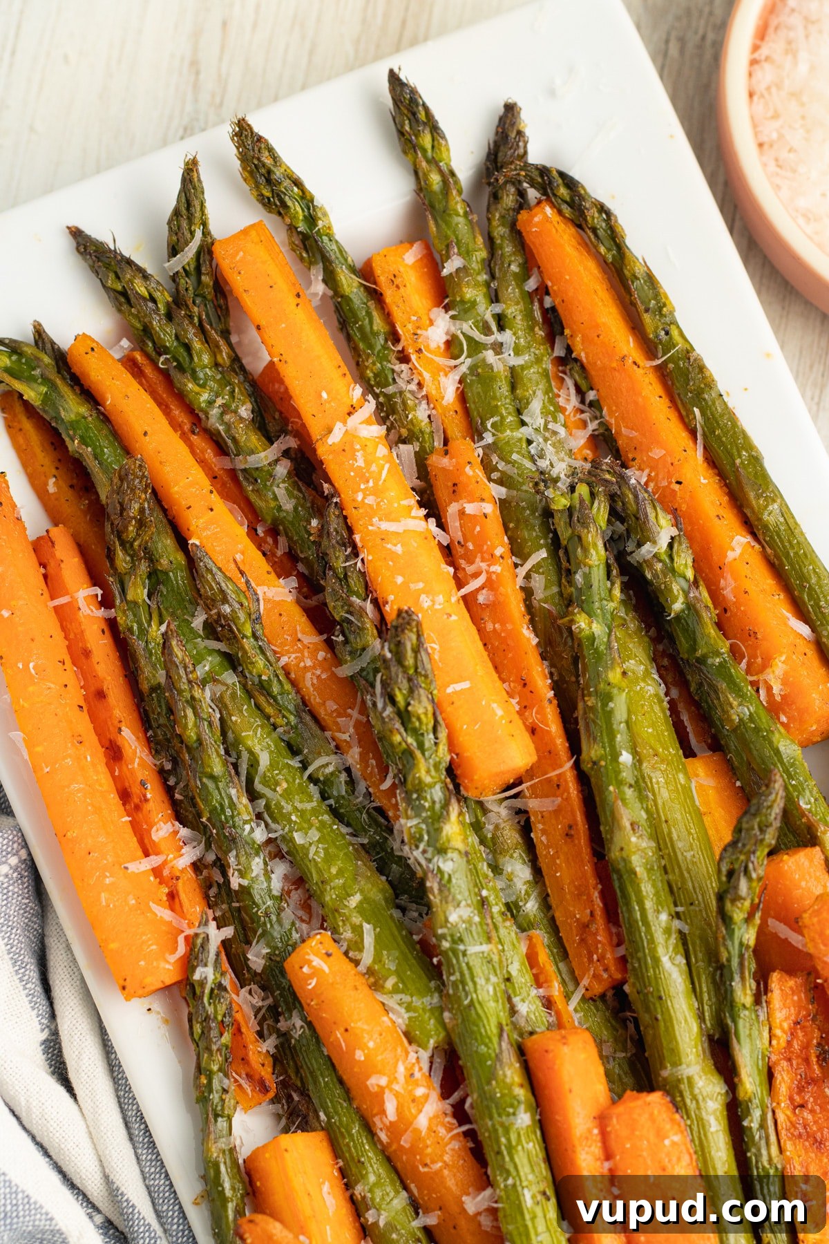 Picture close-up of carrots and asparagus. 