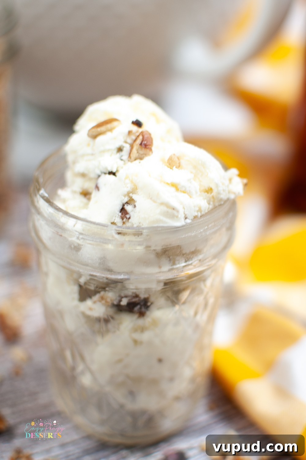 No-Churn Butter Pecan Ice Cream Recipe — Creamy Homemade Treat 4 Close up image of a jar filled with homemade butter pecan ice cream