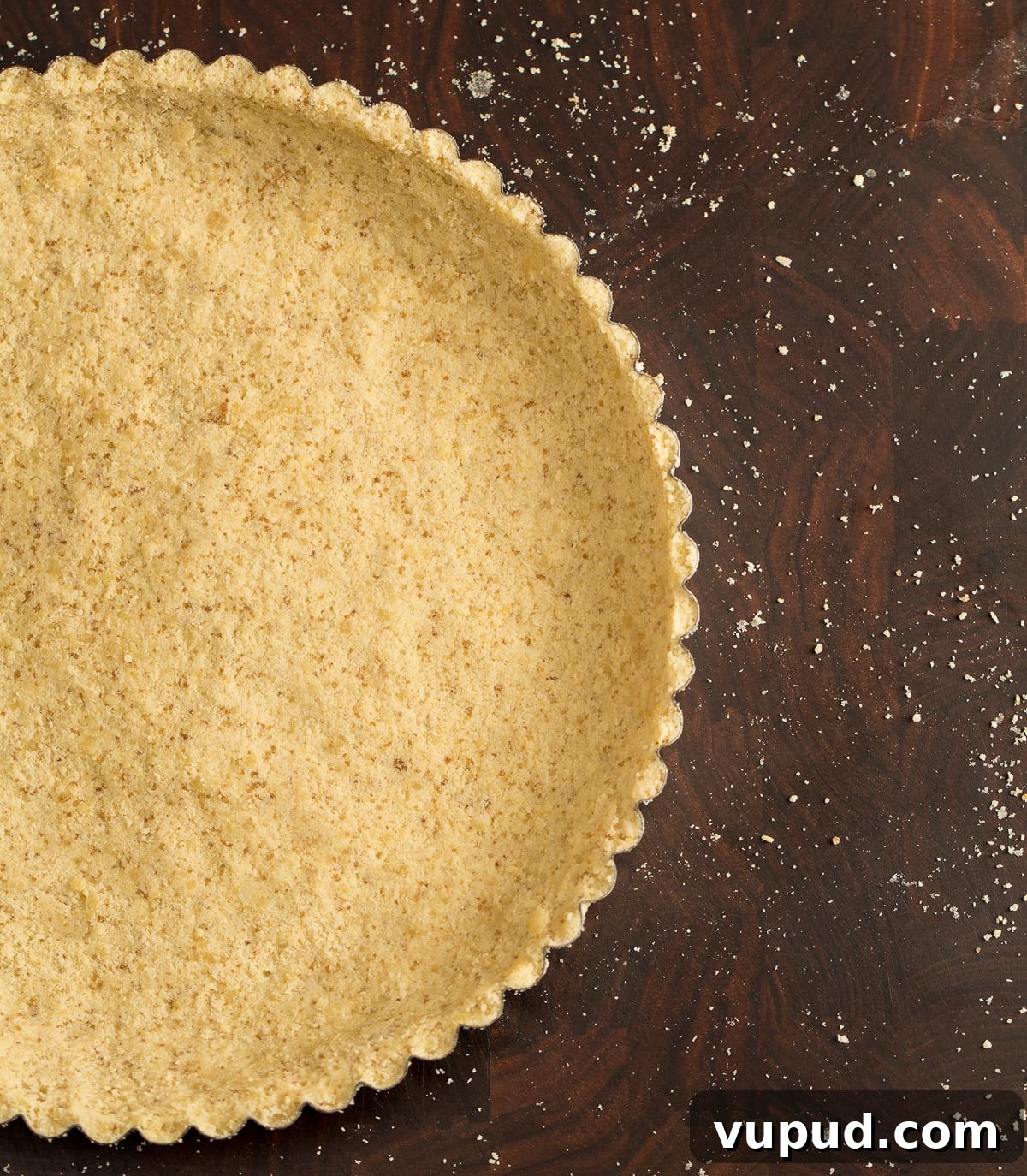 Grain-Free, Gluten-Free Tart Crust Recipe for Flaky Pastry 2 A golden almond flour tart crust ready to be filled.