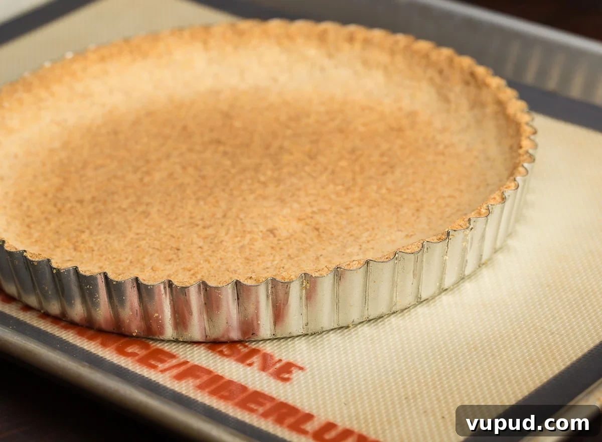 Grain-Free, Gluten-Free Tart Crust Recipe for Flaky Pastry 7 A light golden baked gluten-free tart shell made with almond and coconut flour.