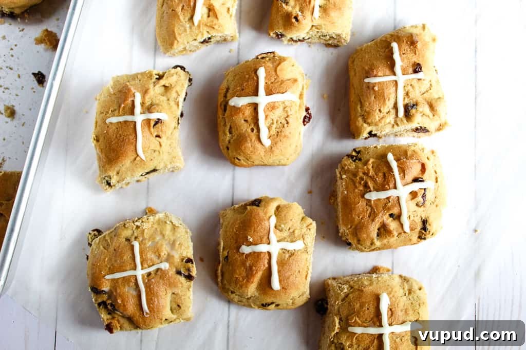 Soft & Fluffy Gluten-Free Hot Cross Buns: Simple Recipe for Spring 15 gluten-free hot cross buns on a cookie sheet