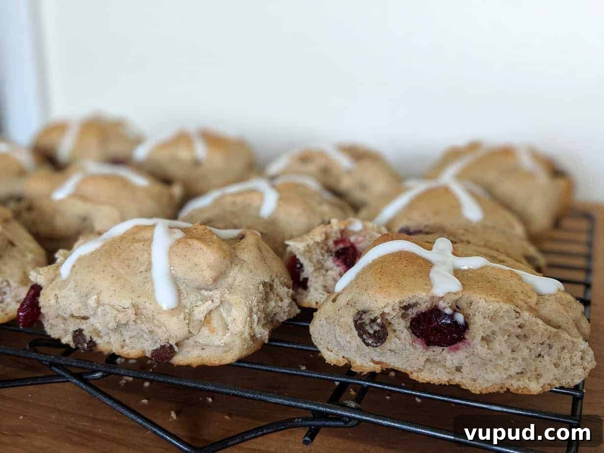 Soft & Fluffy Gluten-Free Hot Cross Buns: Simple Recipe for Spring 18 gluten-free hot cross buns on a rack