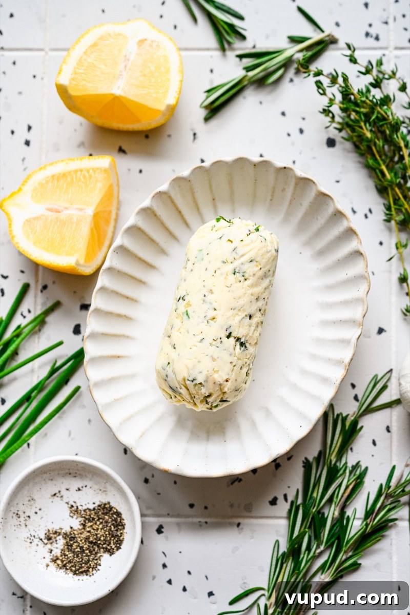 Garlic Herb Compound Butter Recipe for Flavorful Meals 7 Sliced compound butter on plate