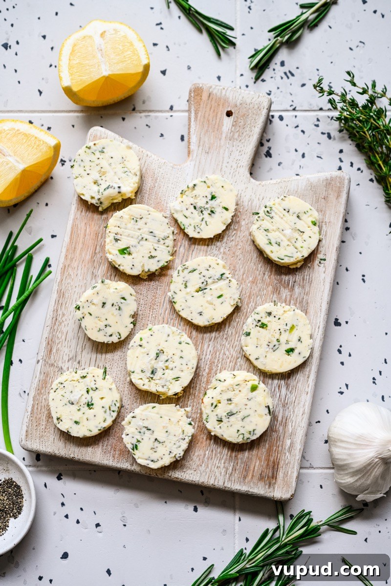 Garlic Herb Compound Butter Recipe for Flavorful Meals 8 Butter round melting on steak