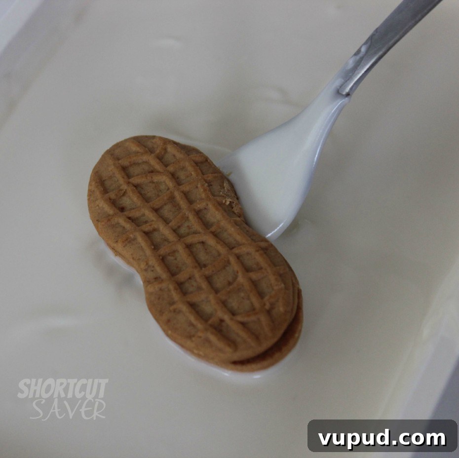 How to Make Nutter Butter Snowman Cookies for Holiday Parties 4 nutter butter snowman process