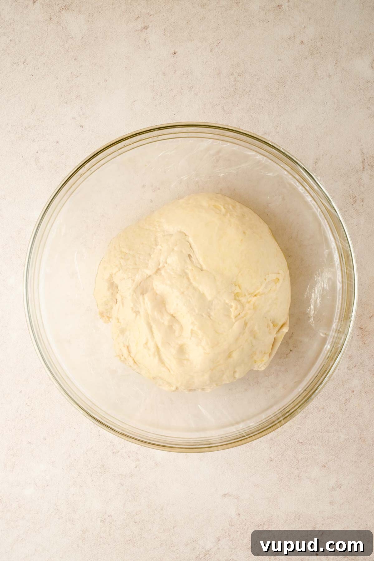 Raspberry Jam Sweet Focaccia Recipe for Soft, Fruity Bread 5 mixed focaccia dough in glass mixing bowl.