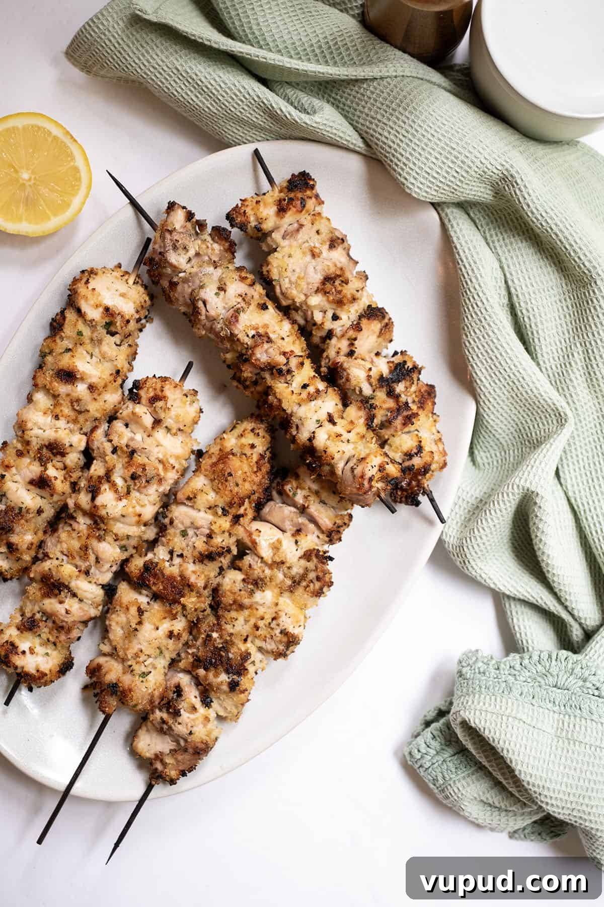 Crispy Chicken Spiedini Skewers with Lemon Herb Marinade 11 Chicken spiedini skewers on a plate.
