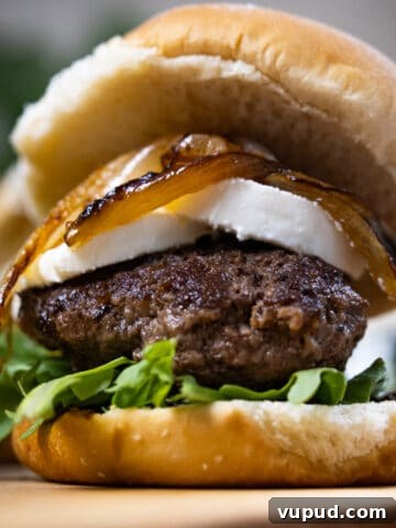 goat cheese and fig jam slider on a cutting board
