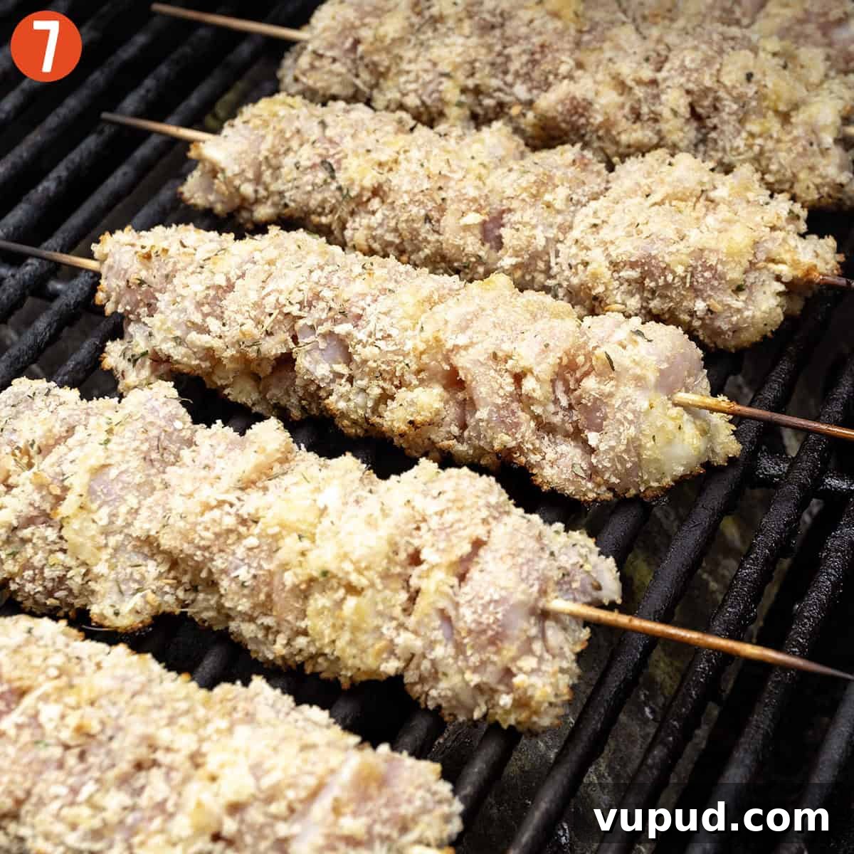 Crispy Chicken Spiedini Skewers with Lemon Herb Marinade 10 Grilling chicken spiedini on the grill.
