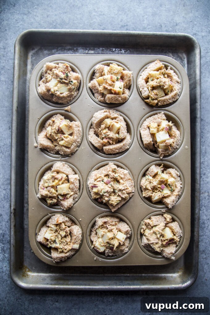 Turmeric Tuna Melt Muffin Bites: Savory Mini Tuna Melts 7 Muffin Pan Turmeric Tuna Melts www.thecuriousplate.com