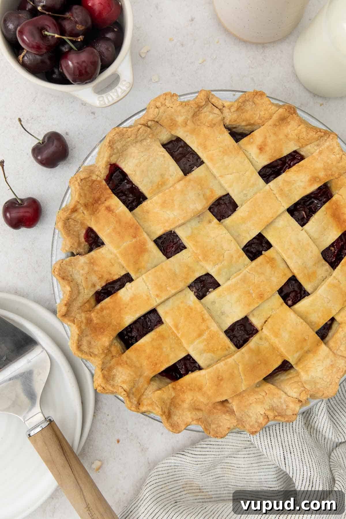 Gluten-Free Cherry Pie Recipe with Flaky Homemade Crust 11 overhead view of cherry pie with lattice work.