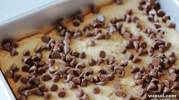 Classic Chewy Toffee Bars Recipe with Buttery Shortbread 7 baked toffee bars sprinkled with chocolate chips