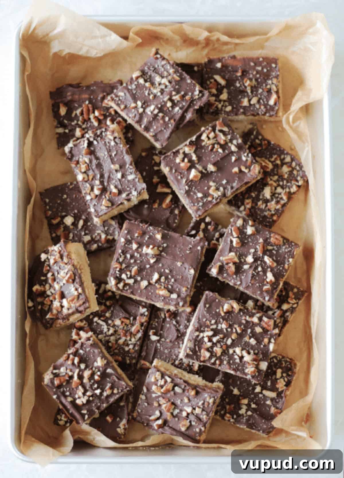 Classic Chewy Toffee Bars Recipe with Buttery Shortbread 9 Pan of toffee bar squares.