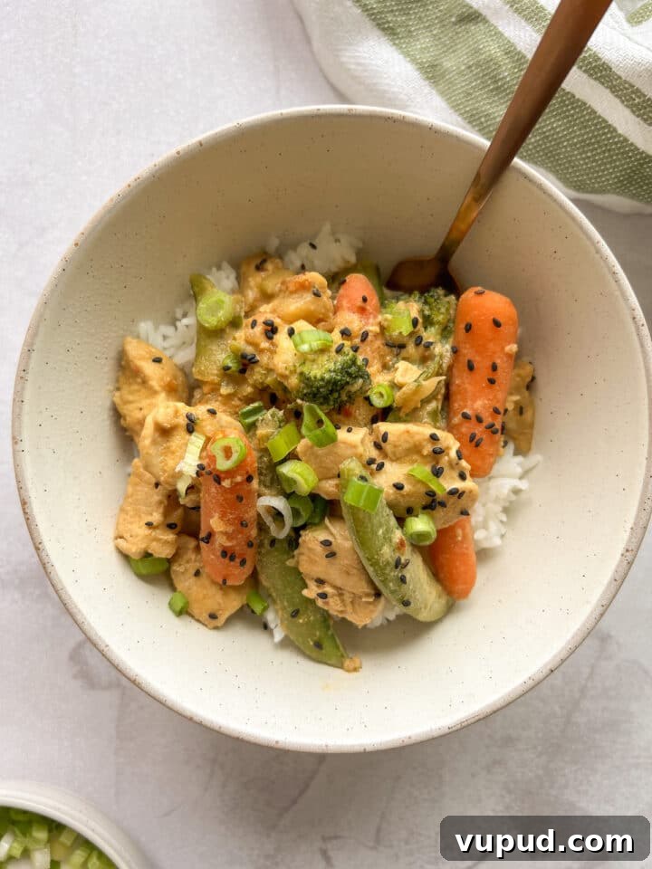 Sesame Garlic Stir-Fry with Frozen Vegetables 3 Frozen vegetable stir fry served over rice in a small white bowl